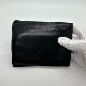Prada leather bi fold wallet